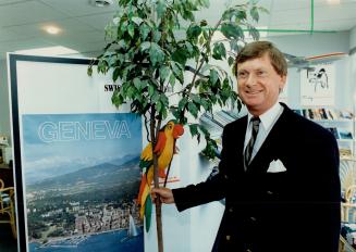 Colin holiday scott: Travel agent left England for Saskaton 28 years ago