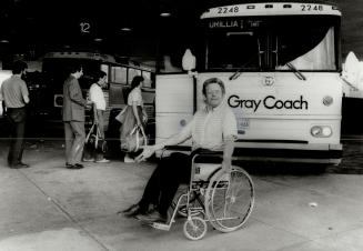Left behind: Ron Semple of North York, confined to a wheel chair by multiple sclerosis, watches buses leave terminal for areas outside Metro, buses not geared to handle the handicapped