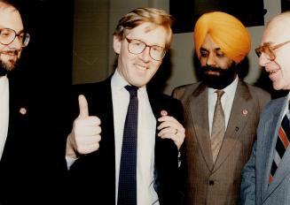 Monohar Singh Bal with Bob Rae 1990 wearing anti racism Lapel Pins
