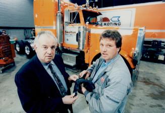 Larry Skelton (left) with son Ron (trucking company)