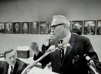 Shouting questions at board of control meeting, demanding to know when - if ever - the city planned to go ahead with redevelopment in the Trefann Court area, landlord Abe Solomon (left) threatened he would evict tenants and level the houses himself