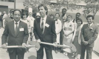 Breaking ground: Japanese businessman C. L. Sun, left, and Jonas Prince of Realstar Hotels get ready to dig.