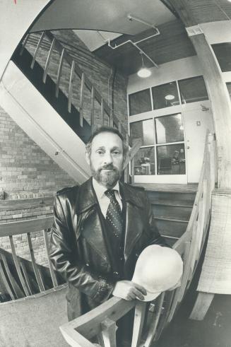 Dedicated to renovating old buildings in downtown Toronto, developer Myron Swartz stands in the new stairwell of Design Centre II at 77 Mowat Ave