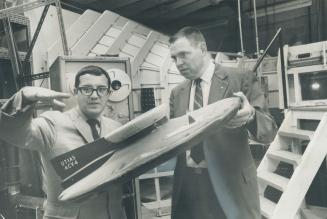 Transport of the future, an air-cushioned vehicle for use on rough terrain, is being developed at the U of T Institute for Space Studies. Dr. Rod Tennyson explains how it works to Henry McKay.The vehicle would be particularly useful in the far North. The institute thinks air curtains might serve as covers for buildings one day instead of roofs.