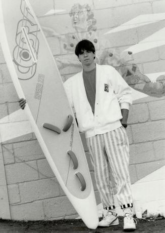 Comfort: Lance Sprackman's summer uniform, cotton pants, T-shirt and cardigan, from Surf Paradise.