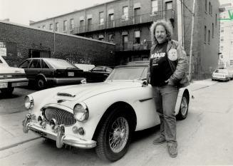 Healey heaven: Ken Sprackman, tavern owner and car connoisseur, fell in love years ago with a '56 Healey, in the fawn-beige color they had then
