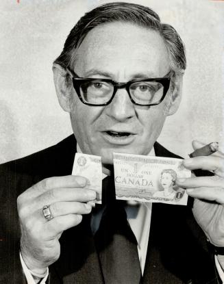 Now an optimist, monetary exprt Charles R