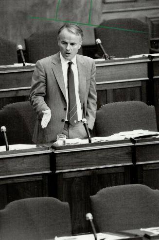 Flawed Law: Conflict-of-interest commissioner Gregory Evans, left, found nothing suspicious in the MPPs' public disclosure statements
