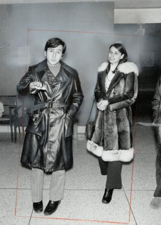 Murray Stillman of Ottawa, a son of mortally wounded David Stillman, and his wife, Shelley, leave Toronto Western Hospital, where his father was being treated