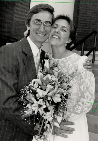 1988 Now they post for the photographer in another embrace, as husband and wife after wedding.