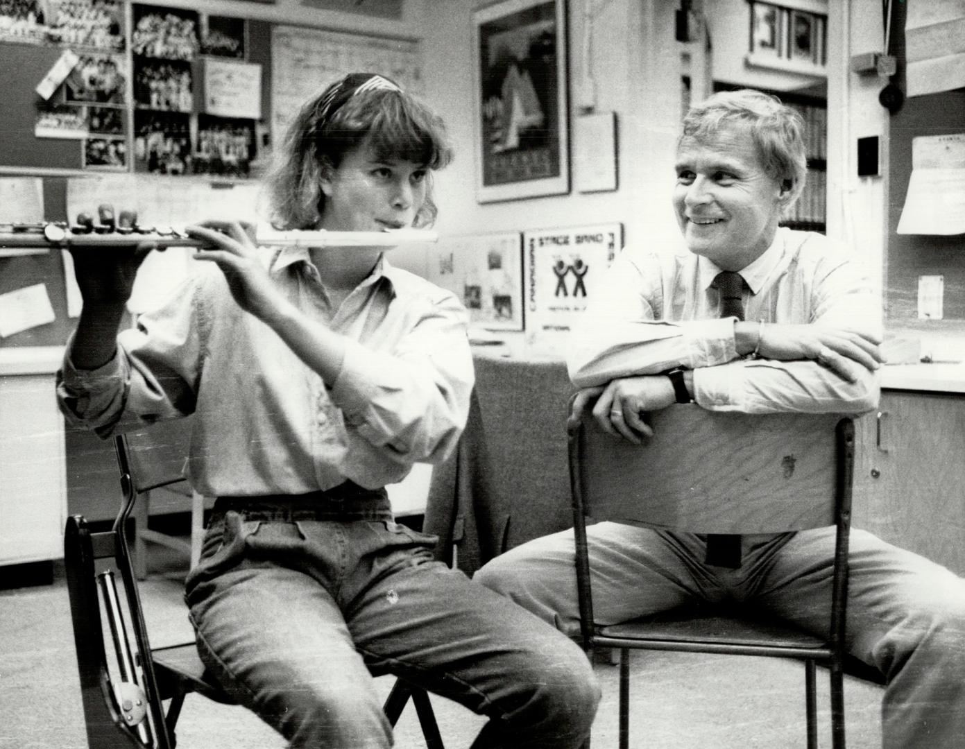 Top teacher: Etobicoke Collegiate institute music teacher Don Strathdee, shown with Andrea Ellison on flute, will retire at the end of the month after teaching at the school for 34 years