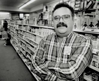 On guard: Drugstore owner Lou Strever says he just 'reacted' when he tackled a man after an attempted robbery at Mimico Pharmacy Monday night.