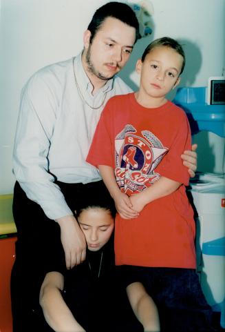 Family love: Eldest brother Joe Sturge, left, says he'd love to care for younger siblings Hailey and Jason
