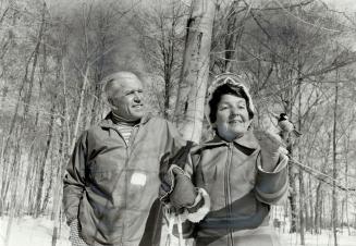 Lee and Audrey Symmes meet the chickadees