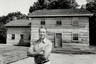 Present from past: Sandy Thain stands outside the luxury home he created by dismantling two historic 19th century log homes and rebuilding them into a $375,000 luxury dwelling overlooking the Kleinburg golf course