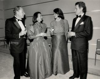 Above, Murray Koffler and his wife Marvelle, at left, greet Spanish ambassador to Canada D. Jose Antonio Fournier and his wife Genevieve.