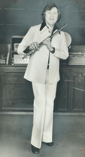 Left: Musician Moe Koffman usually wears denim suit but had this cream colored suit made by House of Mann for appearance with Toronto Symphony.