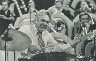 In Toronto taping segment of CBC In the Mood show, 62-year-old drummer Gene Krupa slugs away at music he made famous in the '30s