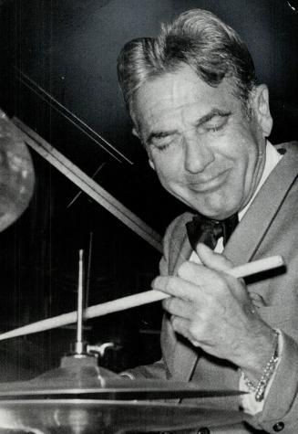 Graying Gene Krupa, 58, unravaged by time. 'He could not swing his way out of a revolving door'