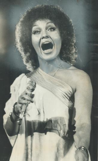 One of the wittiest singers around, sayt The Star's Urjo Kareda of singer Cleo Laine, who last night bewitched a Convocation Hall audience in Toronto debut concert