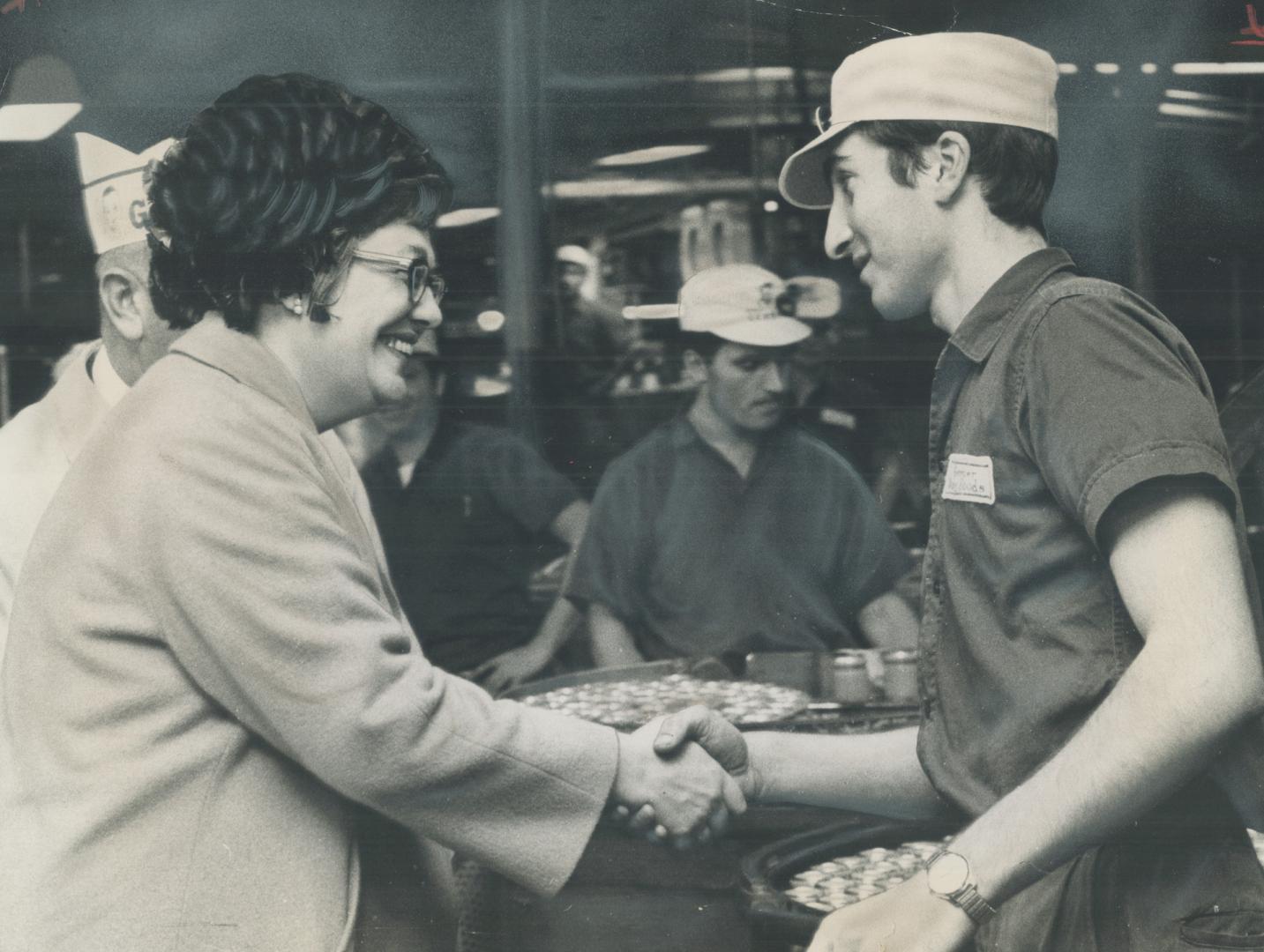 Judy LaMarsh, Minister of National Health and Welfare and MP for Niagara Falls, campaigns in one of the industrial plants in her ridings