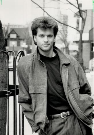 Quick visitor: Lorenzo Lamas relaxes in Yorkville during recent visit to town to promote the movie Snake Eater