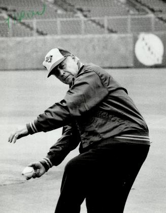 The first pitch: Former Toronto mayor Alan Lamport had the honor of throwing out the first pitch at yesterday's home opener