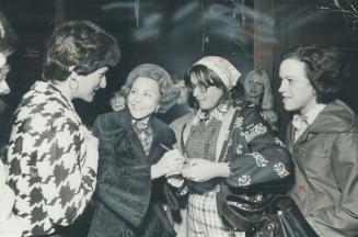 The columnist who reaches 60 million readers, Ann Landers, talks with some fans last night in the Queen Elizabeth Building after a speech sponsored by The Star