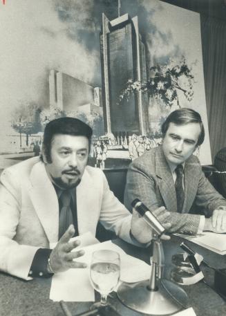 North York Mayor Mel Lastman (left) addresses a press conference announcing a $25 million federal office building (architect's sketch behind him) will be built in the borough