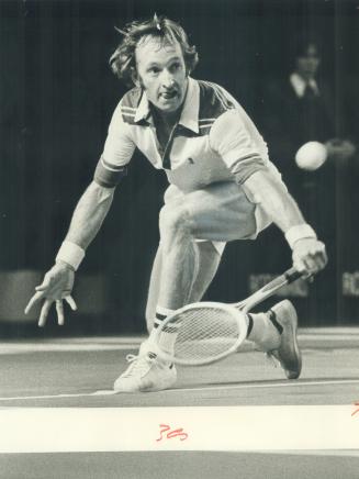 Bad Night All Round: Rod Laver makes a shot in his match against Jimmy Connors