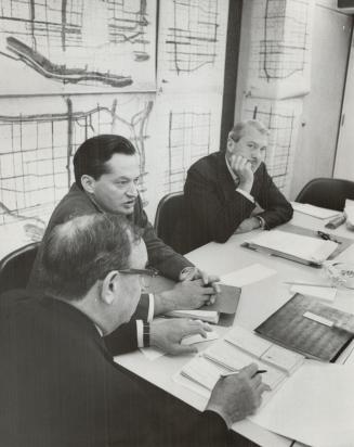 Resign as Tor. Planning Chief with Hebert Orliffe (in foreground) and J. D. Crashley (right)