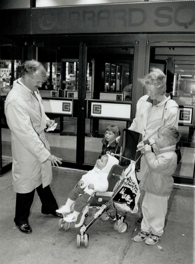 Future voters: Campaigning candidate Jack Layton catches the attention of three kids outside Gerrard Square.