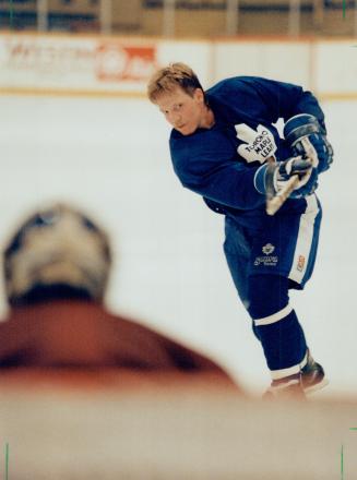 Practice makes perfect: Maple Leaf forward Gary Leeman unleashes a slapshot yesterday during practice at the Gardens.