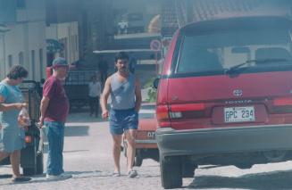 Fugitive Mountie. Jorge Leite walks to his Toyota van at Praia da Vieira Portugal