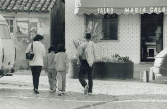 Leite family walking in Praia da Vieria where family went to hide