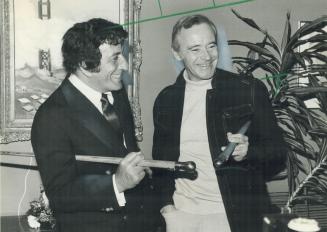 A little variety: Tony Bennett (left) and Jack Lemmon ham it up with walking sticks at a Variety Club of Ontario reception at the Westbury Hotel yesterday