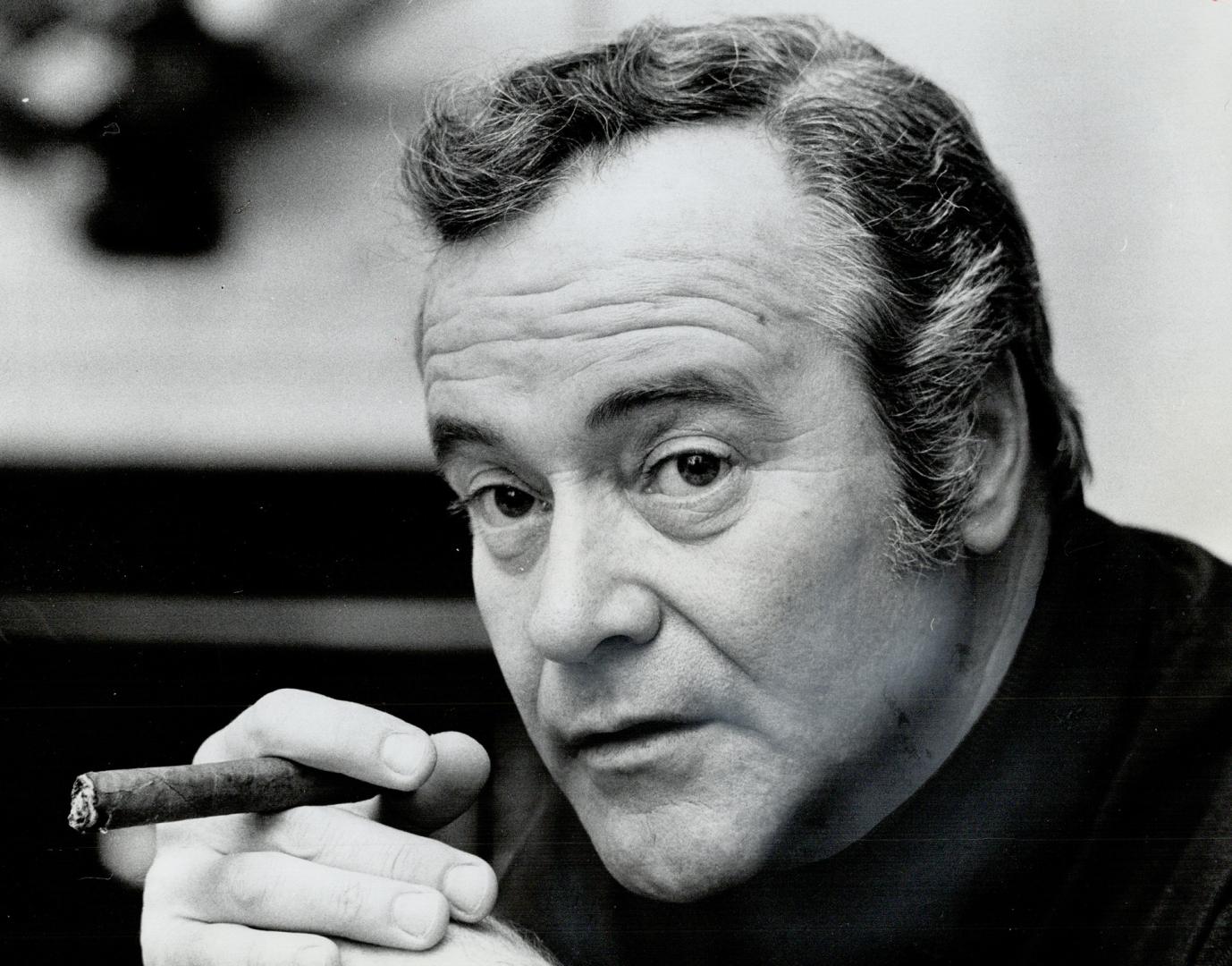 An unusually serious Jack Lemmon makes a point with his cigar during a press conference in Toronto yesterday to publicize his latest movie, Save the Tiger, which opens Friday at the Towne Cinema