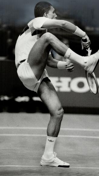 Balanced attack: Ivan Lendl gets everything into this shot against Eliot Teltscher last night at Maple Leaf Gardens