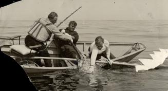 Michael Lerner, below left, lands a broadbill swordfish off Cape Breton after an exciting struggle