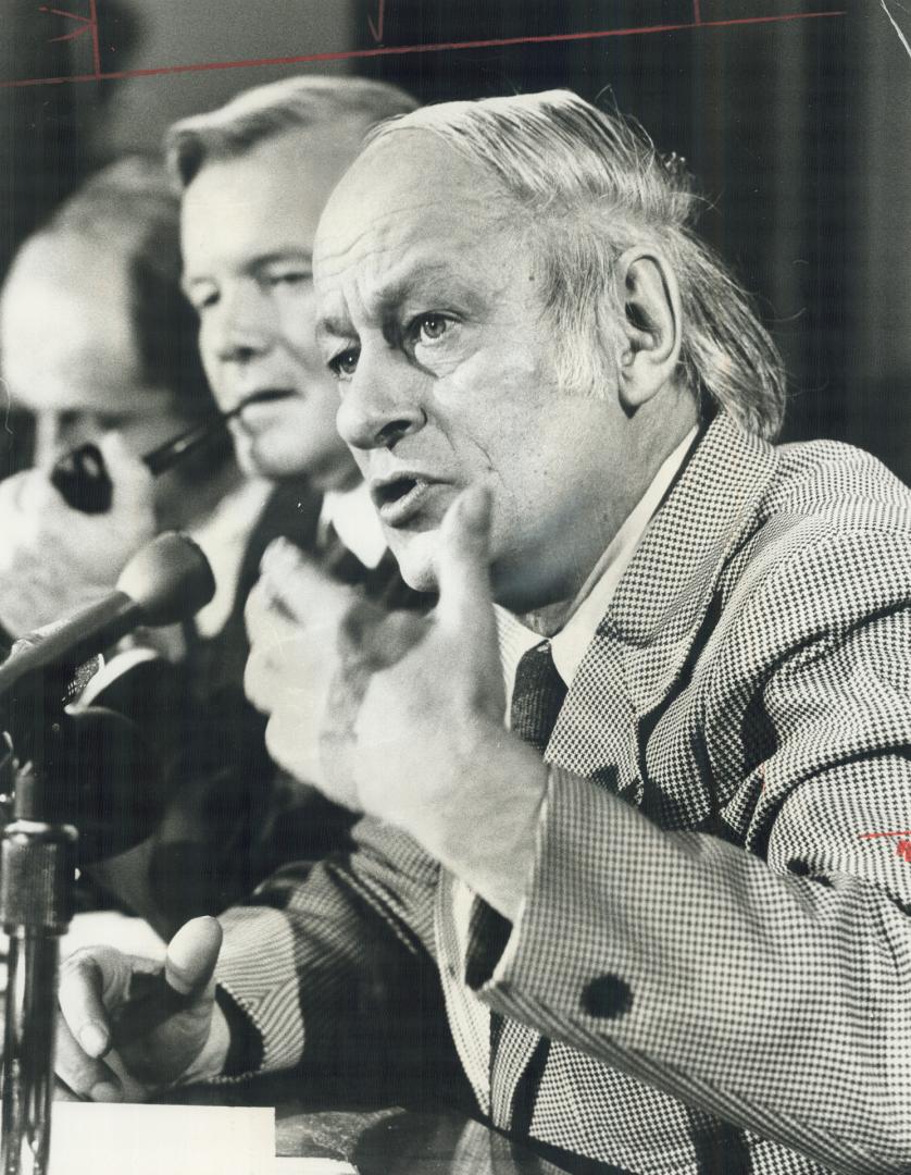 We will always be neighbors, Quebec Premier Rene Levesque tells reporters yesterday after day-long meeting with Premier William Davis (rear)