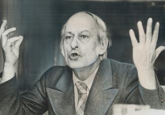 Bourassa (left) challenged Parti Quebecois leader Rene Levesque to a public debate on economic consequences of Quebec independence and its impact on Canadian dollar