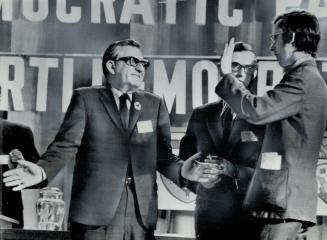 NDP foes meet: David Lewis, deputy leader of the New Democratic Party, faces Professor Melville Watkins (right) after Lewis had called Watkins' proposal for a mass NDP shift to the left horribly indigestible rubbish