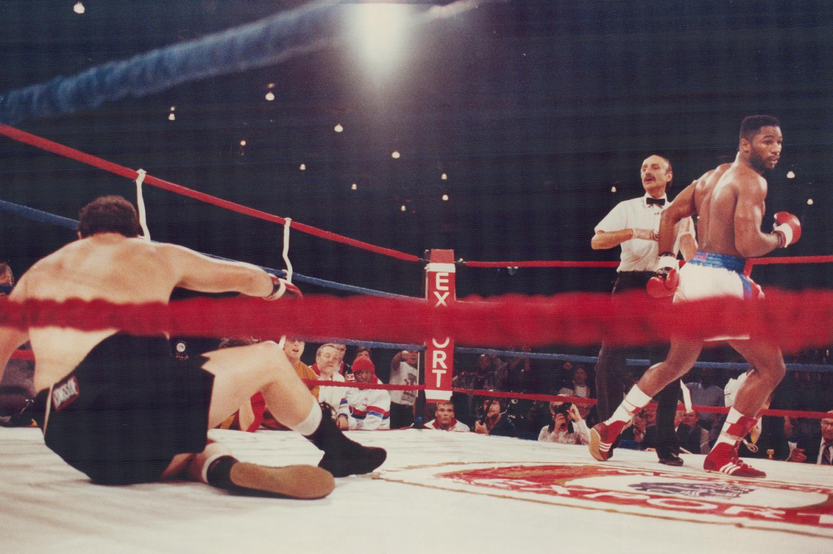First fall: Greg (the Gorilla) Gorrell got a taste of things to come in the first round last night, as Lennox Lewis knocked him flat as a pancake.