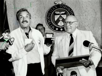 Barney Miller promoted: Hal Linden, who plays captain Barney Miller in the TV series, was promoted honorary chief of detectives by Metro Police Chief Jack Ackroyd today and here he shows off his new badge after swearing-in ceremony
