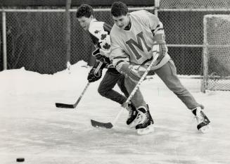 Oh, brother: Eric Lindros, right, has spent a lot of time on the family's backyard rink with brother Brett