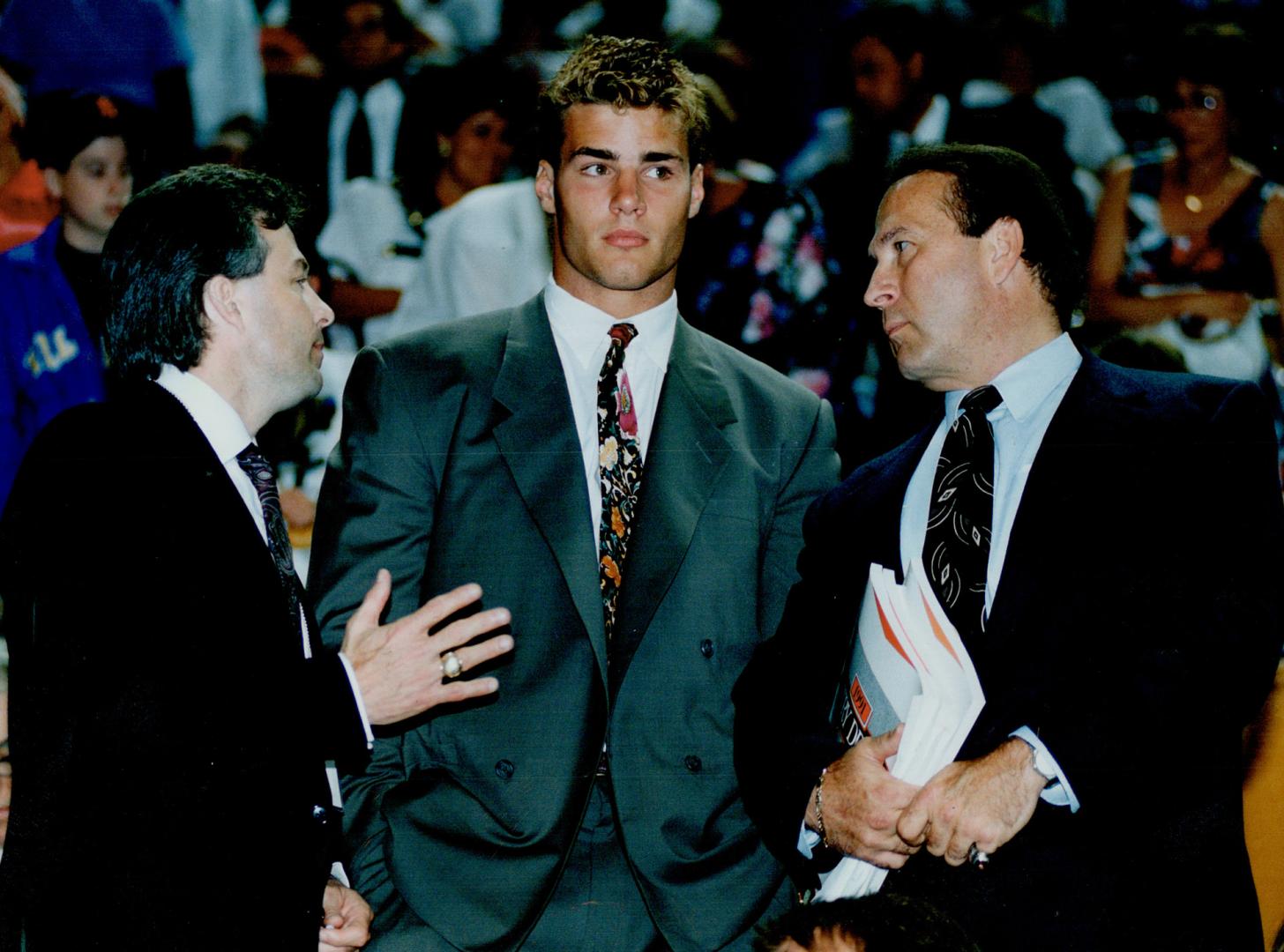 Seeing stars: Eric Lindros was rocked in a collision with Brent Sutter.