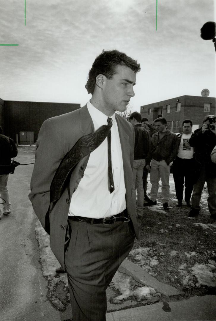 Eric's last stand: Hockey superstar Eric Lindros leaves an Oshawa court yesterday after testifying at his trial. The verdict is expected Monday.
