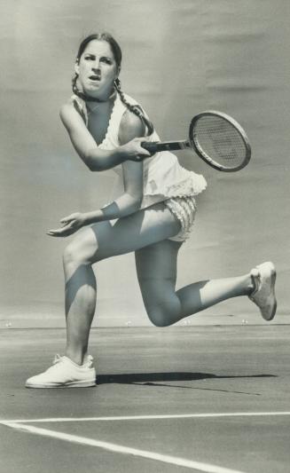 Queen of the courts: Chris Evert of the United States, 19-year-old Wimbledon champion, demonstrates her forehand in win over Kazuko Sawamatsu in Canadian Open Tennis championships at Toronto Lawn Tennis Club