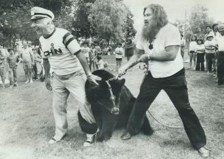 Smokey the Bear took on all comers including Johnny Lombardi and the Northern Wild Man (right). The result was a tie.