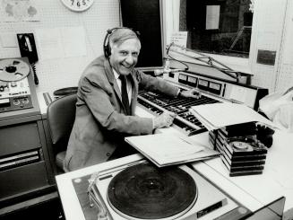 Money and people: Bay St. - the economic heart. Above, Toronto's Johnny Lombardi broadcasts in 32 languages.